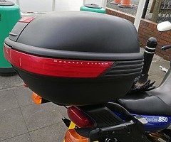 Motorcycle hard luggage and carrier