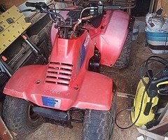 Suzuki farm quad