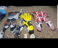 motocross suits , boots , helmet