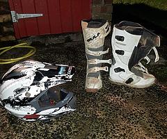 motocross suits , boots , helmet