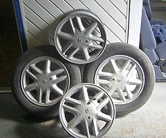 renault 15 inch alloys 4 stood with key