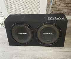 2 12"pioneer speaker cones in edge bass box