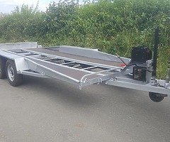 Tilt bed trailer