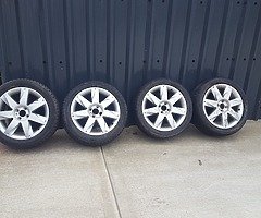 17'' Alloys with two good tyres.