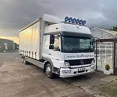 2006 MERCEDES – SLEEPER CAB CURTAIN SIDER 1018