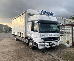 2006 MERCEDES – SLEEPER CAB CURTAIN SIDER 1018