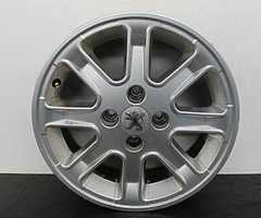 Buy 4 alloy wheels for Peugeot and a rear-view mirror.