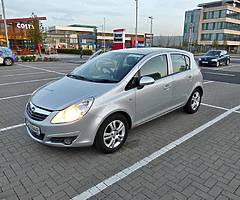 Silver Opel Corsa 1.2 (manual)