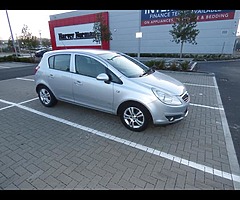 Silver Opel Corsa 1.2 (manual)