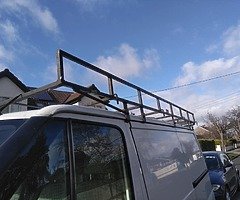 Roof rack with roller...