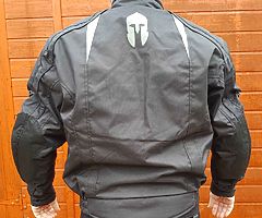New,size L motorcycle jacket. Elbow and shoulder armour.