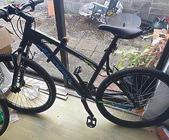 Mountain bike for sale with lock and night illuminators