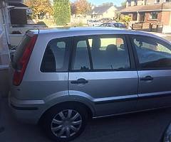 Silver Ford Fusion NCT