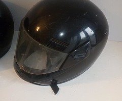 TWO USED MOTORCYCLE HELMETS