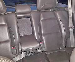 SANTA FE REAR LEATHER SEATS AND DOG BOOT GUARD