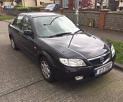 Mazda 323 tax and test just up