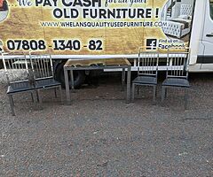 Black glass znd chrime dining room table and 4 chairs £125