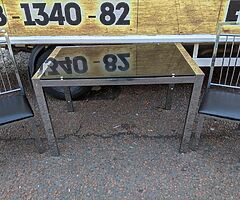 Black glass znd chrime dining room table and 4 chairs £125 - Image 5/10