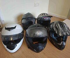 5 road legal helmets and three armoured jackets read description