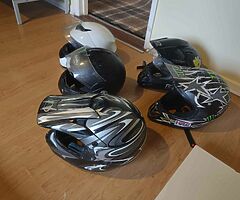 5 road legal helmets and three armoured jackets read description