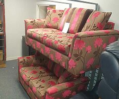 3 and 2 seater sofa in a tan and pink fabric LITERALLY IN NEW CONDITION