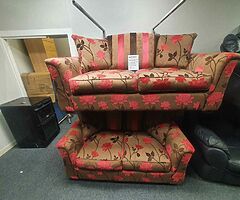 3 and 2 seater sofa in a tan and pink fabric LITERALLY IN NEW CONDITION