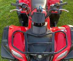 Suzuki 250 farm quad