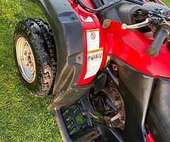 Suzuki 250 farm quad