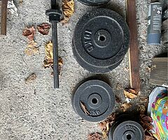 Barbell + weights + tyre for training