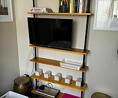 Shelving unit with with wooden shelves and industrial piping. - Image 4/5