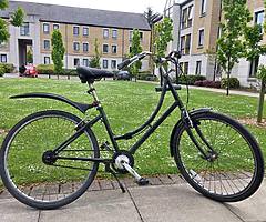 A bike, a lock and a children’s reflective vest