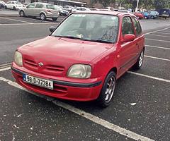 Red Nissan Micra