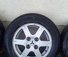 Mitsubishi wheels 4x114 tidy set of alloys 4 very good tyres 15inch