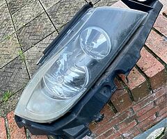 E90 headlight left pre loci