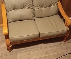 Two seater leather arm chair