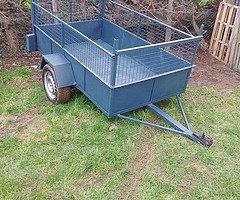 7x4 single axle trailer for sale steel  cage on the sides front and back ,light holders ,