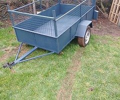 7x4 single axle trailer for sale steel  cage on the sides front and back ,light holders ,