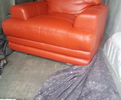 one Red seater sofa chair with very good condition  free Delivery any where in Dublin