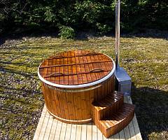 Log cabins, wood burning hot tubs and wood burning saunas