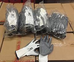 BOXES OF GREY WORK GLOVES