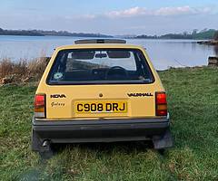 1986 jamica yellow vauxhall nova