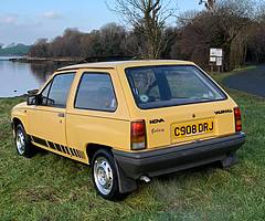 1986 jamica yellow vauxhall nova