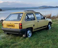 1986 jamica yellow vauxhall nova