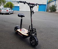 EVO Powerboard 60 KPH 2000 watt Mega scooter @ muckandfun