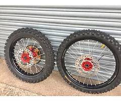 Anyone have a set fo wheels to suit a crf/cr