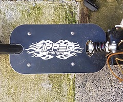 zipper petrol scooter