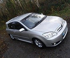 2005 E12 Corolla facelift